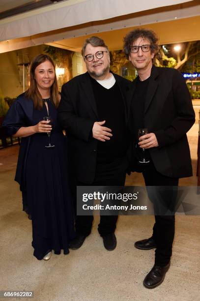 Ann Murphy, Guillermo del Toro and Neil Gaiman attend Fondazione Prada Private Dinner during the 70th annual Cannes Film Festival at Restaurant Fred...