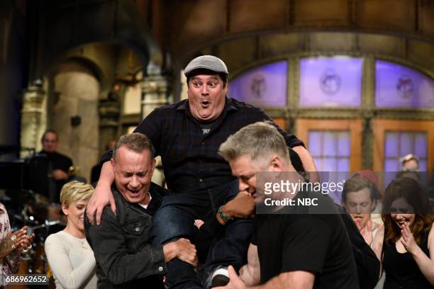 Dwayne Johnson" Episode 1725 -- Pictured: Tom Hanks, Bobby Moynihan, Alec Baldwing during "Goodnights & Credits" in Studio 8H on May 20, 2017 --