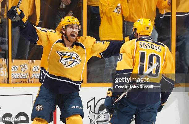 Colin Wilson celebrates the goal by Colton Sissons of the Nashville Predators against the Anaheim Ducks in Game Six of the Western Conference Final...