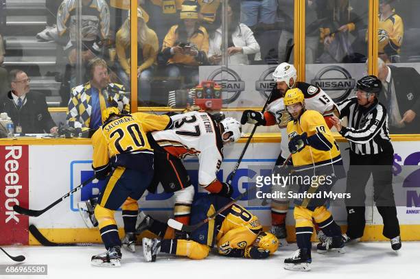 Nick Ritchie of the Anaheim Ducks boards Viktor Arvidsson of the Nashville Predators during the first period in Game Six of the Western Conference...