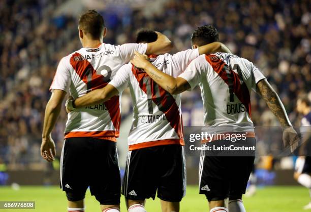 Gonzalo Martinez of River Plate celebrates with teammates Lucas Alario and Sebastian Driussi after scoring the second goal of his team during a match...