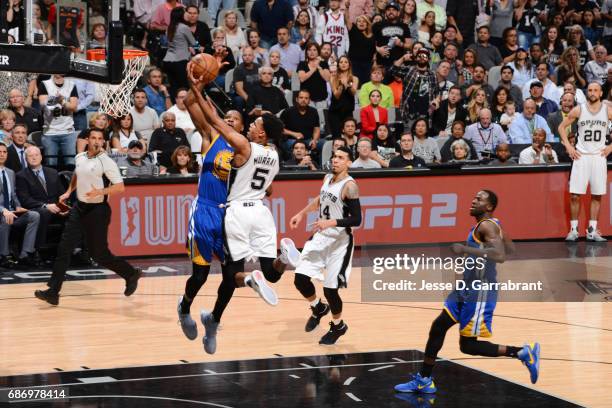 Dejounte Murray of the San Antonio Spurs goes up for a lay up against the Golden State Warriors during Game Four of the Western Conference Finals of...