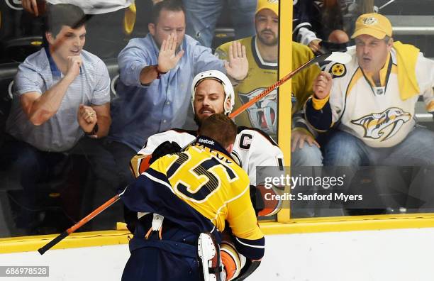 Cody McLeod of the Nashville Predators and Ryan Getzlaf of the Anaheim Ducks tussle during the second period in Game Six of the Western Conference...