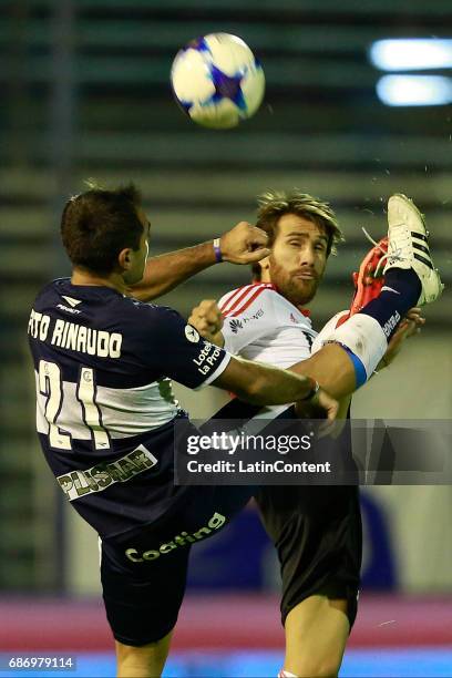 Leonardo Ponzio of River Plate fights for the ball with Fabian Rinaudo of Gimnasia y Esgrima during a match between Gimnasia y Esgrima La Plata and...