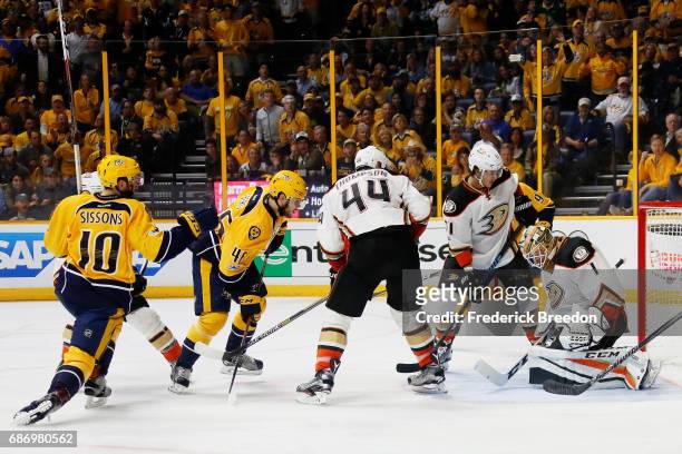 Pontus Aberg of the Nashville Predators scores a goal against the defense of Jonathan Bernier of the Anaheim Ducks during the third period in Game...