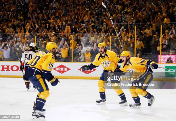 Pontus Aberg of the Nashville Predators celebrates with teammates after scoring a goal against the Anaheim Ducks during the third period in Game Six...