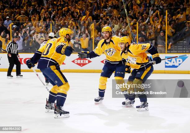 Pontus Aberg of the Nashville Predators celebrates with teammates after scoring a goal against the Anaheim Ducks during the third period in Game Six...