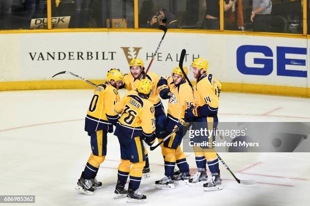 Pontus Aberg of the Nashville Predators celebrates with teammates after scoring a goal against the Anaheim Ducks during the third period in Game Six...