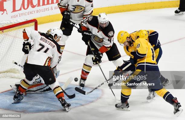 Colton Sissons of the Nashville Predators scores a goal against the defense of Jonathan Bernier of the Anaheim Ducks during the third period in Game...