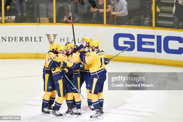 Colton Sissons of the Nashville Predators celebrates with teammates after scoring a goal against the Anaheim Ducks during the third period in Game...