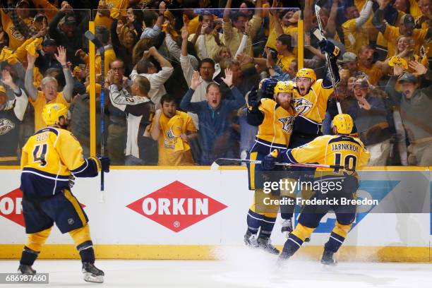 Colton Sissons of the Nashville Predators celebrates with teammates after scoring during the third period against the Anaheim Ducks in Game Six of...