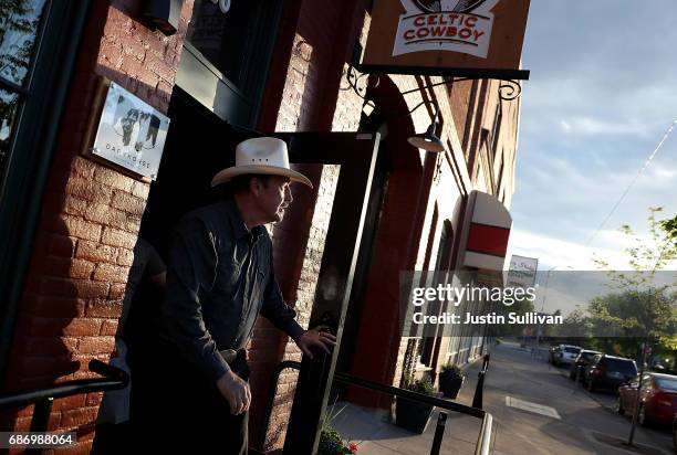 Democratic U.S. Congressional candidate Rob Quist leaves a gathering at Darkhorse Hall and Wine Snug on May 22, 2017 in Great Falls, Montana. Rob...