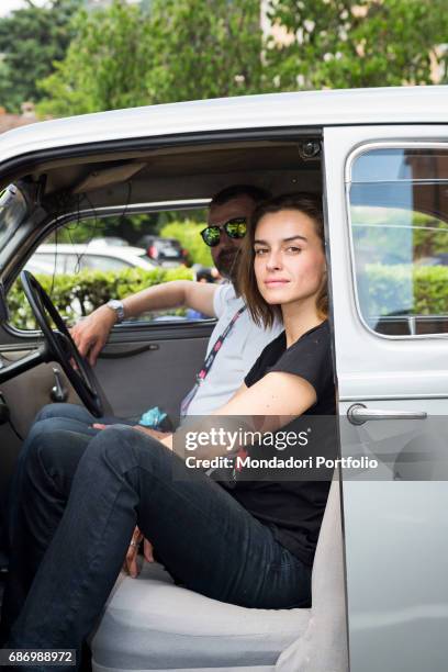 The actress Kasia Smutniak sitting in a car. Brescia, Italy. 30th May 2014