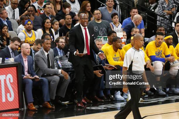 Interim head coach Mike Brown of the Golden State Warriors reacts in the first half against the San Antonio Spurs during Game Four of the 2017 NBA...