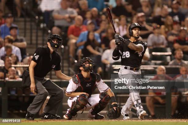 Leury Garcia of the Chicago White Sox hits a solo home run against the Arizona Diamondbacks during the fifth inning of the MLB game at Chase Field on...