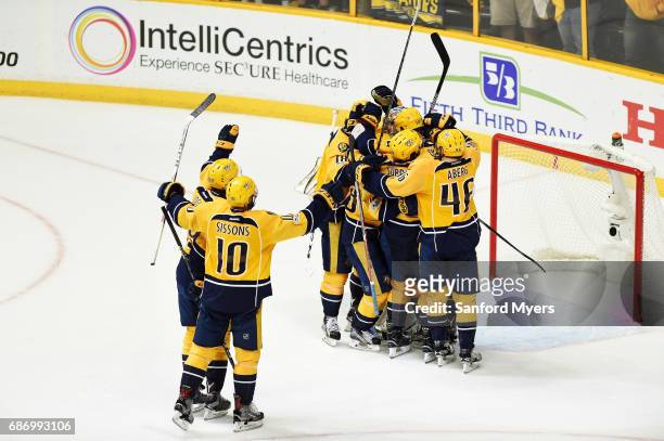 The Nashville Predators celebrate their 6-3 win over the Anaheim Ducks in Game Six of the Western Conference Final during the 2017 Stanley Cup...