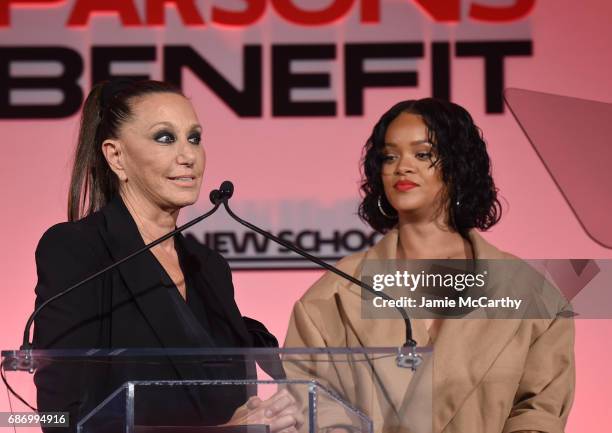 Rihanna introduces Donna Karan on stage during the 69th Annual Parsons Benefit at Pier 60 on May 22, 2017 in New York City.