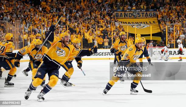 Mattias Ekholm, Viktor Arvidsson, James Neal, Pontus Aberg and P.K. Subban of the Nashville Predators skate to celebrate a 6-3 win against the...