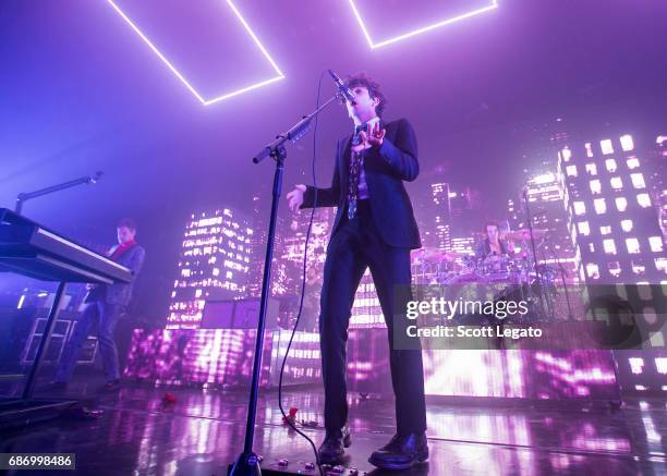 Adam Hann, Matthew "Matty" Healy and George Daniel of The 1975 perform at The Fillmore Detroit on May 22, 2017 in Detroit, Michigan.