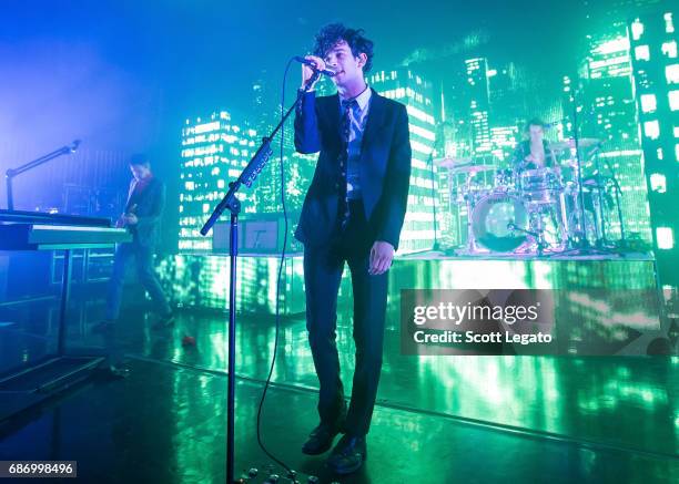 Adam Hann, Matthew "Matty" Healy and George Daniel of The 1975 perform at The Fillmore Detroit on May 22, 2017 in Detroit, Michigan.