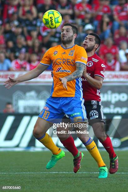 Andre Pierre Gignac of Tigres fights for the ball with Hiram Muñoz of Tijuana during the semi final second leg match between Tijuana and Tigres UANL...