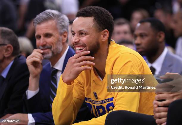Stephen Curry of the Golden State Warriors reacts on the bench in the second half against the San Antonio Spurs during Game Four of the 2017 NBA...