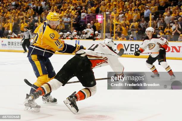 Colton Sissons of the Nashville Predators checks Cam Fowler of the Anaheim Ducks in Game Six of the Western Conference Final during the 2017 Stanley...