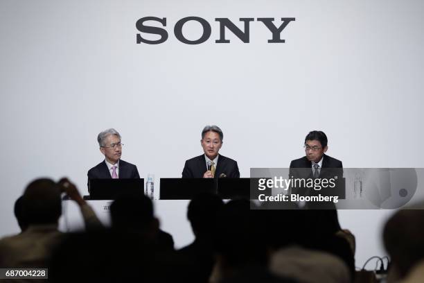 Kazuo Hirai, president and chief executive officer of Sony Corp., center, speaks while Kenichiro Yoshida, executive deputy president and chief...