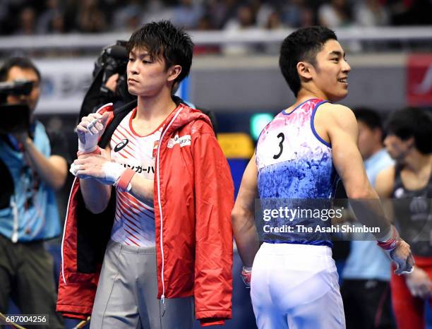 Kohei Uchimura and Kenzo Shira looks on during day two of the Artistic Gymnastics NHK Trophy at Yoyogi National Gymnasium on May 21, 2017 in Tokyo,...