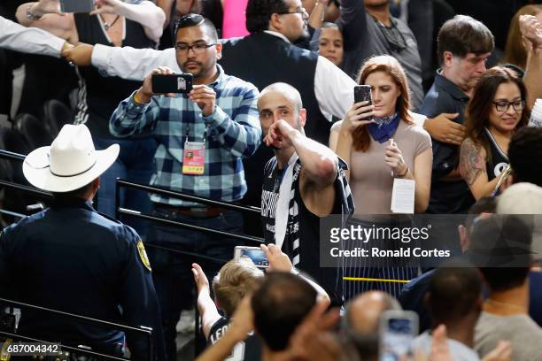 Manu Ginobili of the San Antonio Spurs reacts as he leaves the court after the Golden State Warriors defeated the San Antonio Spurs 129-115 in Game...