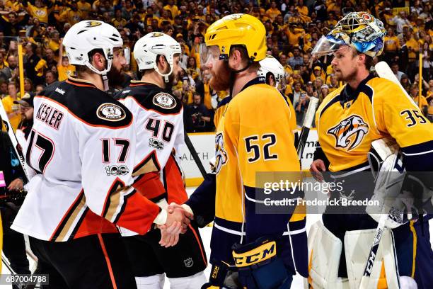 Ryan Kesler of the Anaheim Ducks shakes hands with Matt Irwin of the Nashville Predators after the Predators defeated the Ducks 6 to 3 in Game Six of...