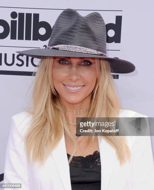 Tish Cyrus arrives at the 2017 Billboard Music Awards at T-Mobile Arena on May 21, 2017 in Las Vegas, Nevada.
