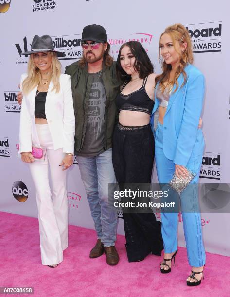 Tish Cyrus, Billy Ray Cyrus, Noah Cyrus and Brandi Cyrus arrive at the 2017 Billboard Music Awards at T-Mobile Arena on May 21, 2017 in Las Vegas,...