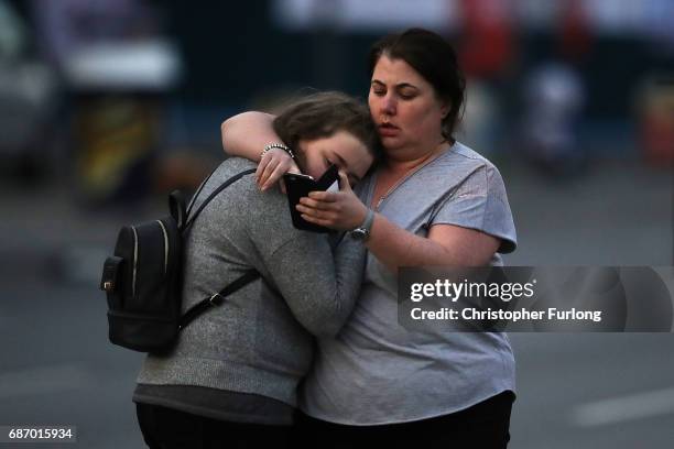 Ariana Grande concert attendees Vikki Baker and her daughter Charlotte, aged 13, leave the Park Inn where they were given refuge after last night's...