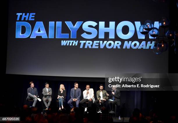 The Daily Show correspondents Jordan Klepper, Ronny Chieng, Desi Lydic, host Trevor Noah, Roy Wood Jr., Hasan Minhaj and moderator Michael Schneider...