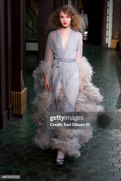 Model walks the runway during the Wolk Morais Collection 5 Fashion Show at Yamashiro Hollywood on May 22, 2017 in Los Angeles, California.