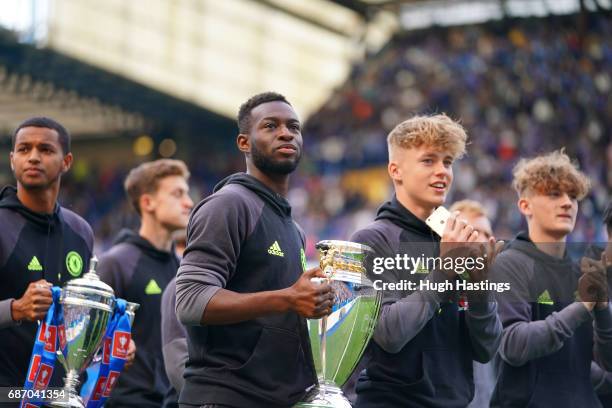 Chelsea's triple cup winning U18 squad parade their trophies at half-time during the Premier League match between Chelsea and Sunderland at Stamford...