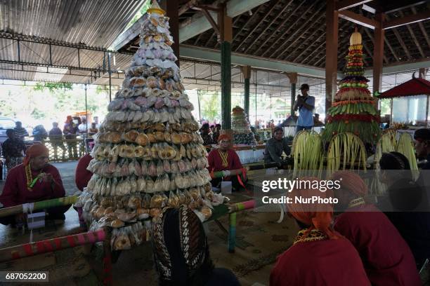 Javanese follows Nyadran ritual at Sewu Cemetery, Yogyakarta, Indonesia on May 22, 2017. Nyadran ritual is a tradition to clean up and pray to their...