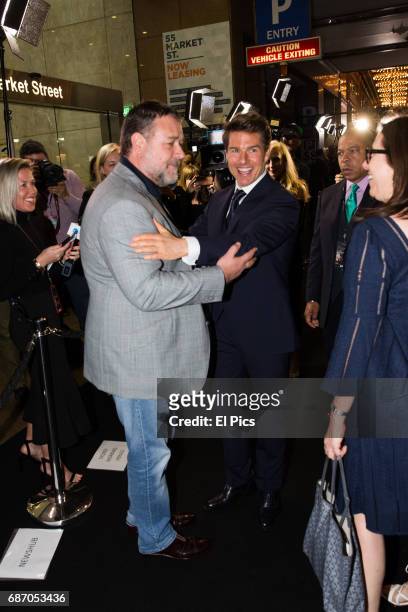 Tom Cruise meets Russell Crowes children on the black carpet as he arrives ahead of The Mummy Australian Premiere at State Theatre on May 22, 2017 in...