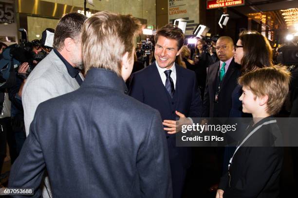 Tom Cruise meets Russell Crowes children on the black carpet as he arrives ahead of The Mummy Australian Premiere at State Theatre on May 22, 2017 in...