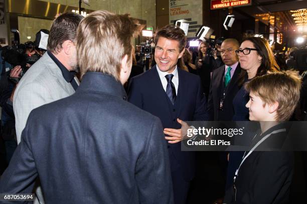 Tom Cruise meets Russell Crowes children on the black carpet as he arrives ahead of The Mummy Australian Premiere at State Theatre on May 22, 2017 in...