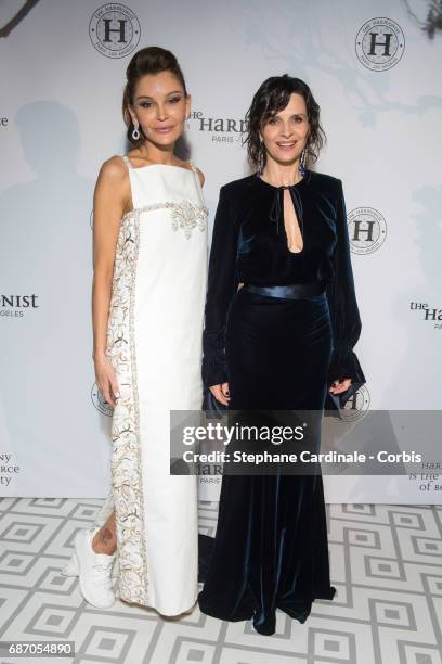 Lola Karimova-Tillyaeva and Juliette Binoche at The Harmonist Party during the 70th annual Cannes Film Festival at on May 22, 2017 in Cannes, France.