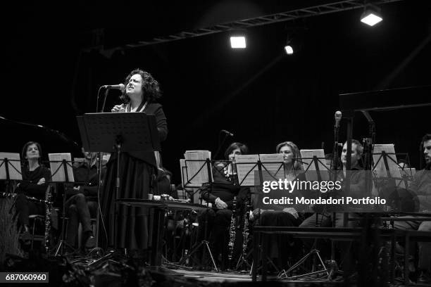 Singer Antonella Ruggiero performing with the Banda cittadina di Iseo at the Teatro Mucchetti in a original Christmas concert. Adro, Italy. 11th...