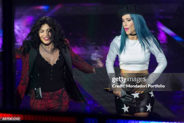 Singer-songwriter Giusy Ferreri and rapper Baby K performing at the final live show of series 10 of X Factor at Mediolanum Forum of Assago. Assago,...