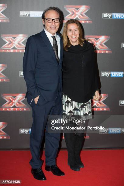 Journalist Guido Meda and his wife Guri at the final live show of series 10 of X Factor at Mediolanum Forum of Assago. Assago, Italy. 15th December...