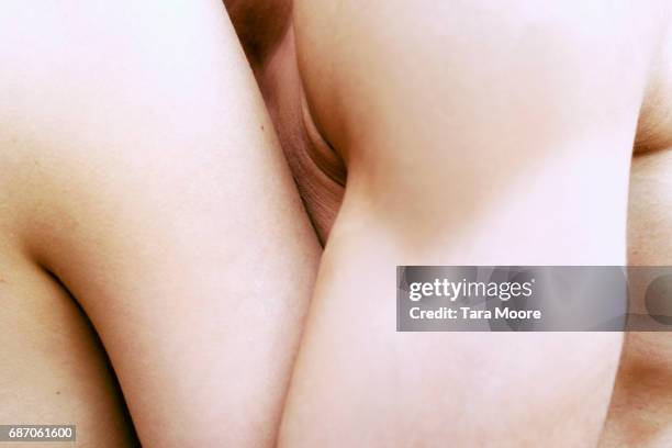 close-up of man and woman hugging - vorspiel stock-fotos und bilder