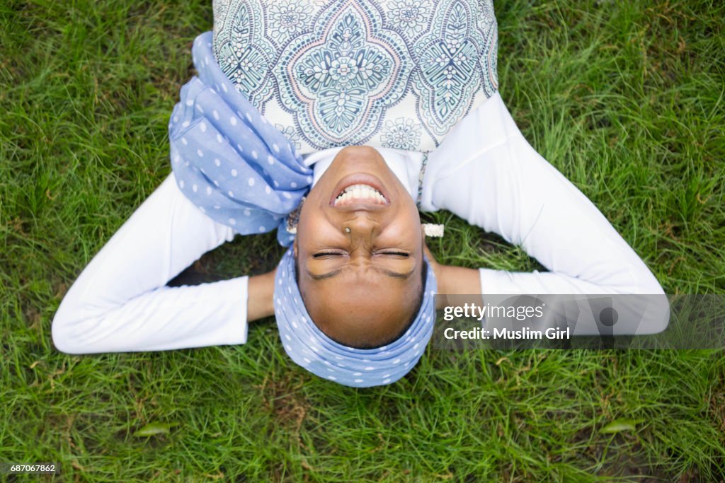#MuslimGirl Smiling On The Grass