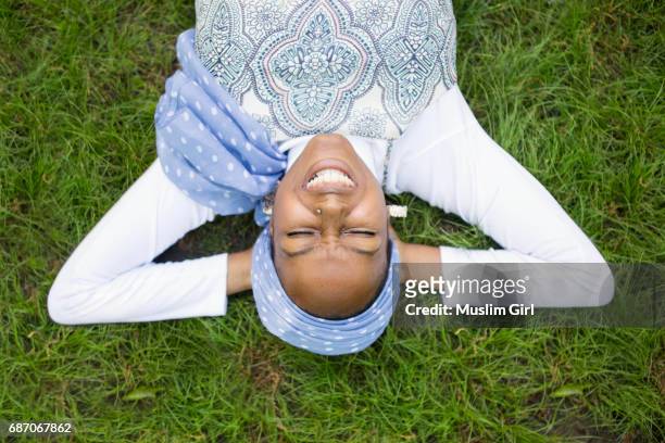 #MuslimGirl Smiling On The Grass