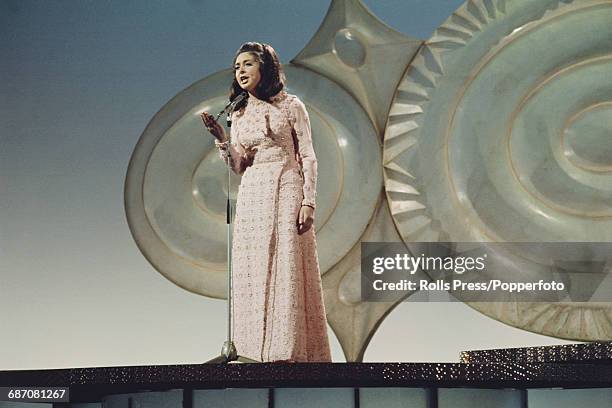 Irish singer Angela Farrell performs the song 'One Day Love' on stage for Ireland in the 1971 Eurovision Song Contest at the Gaiety Theatre in...