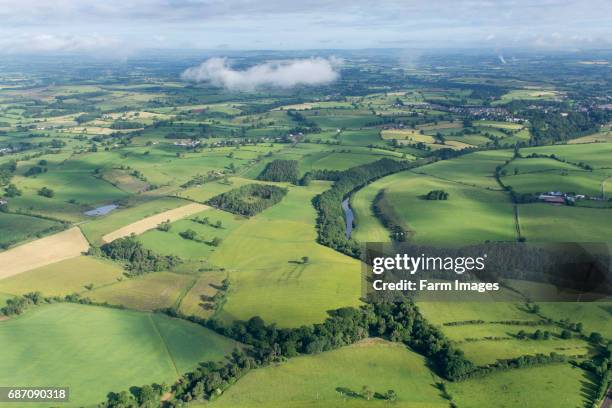 Countryside in the Eden Valley, Cumbria, showing farmland and woodland from the air.